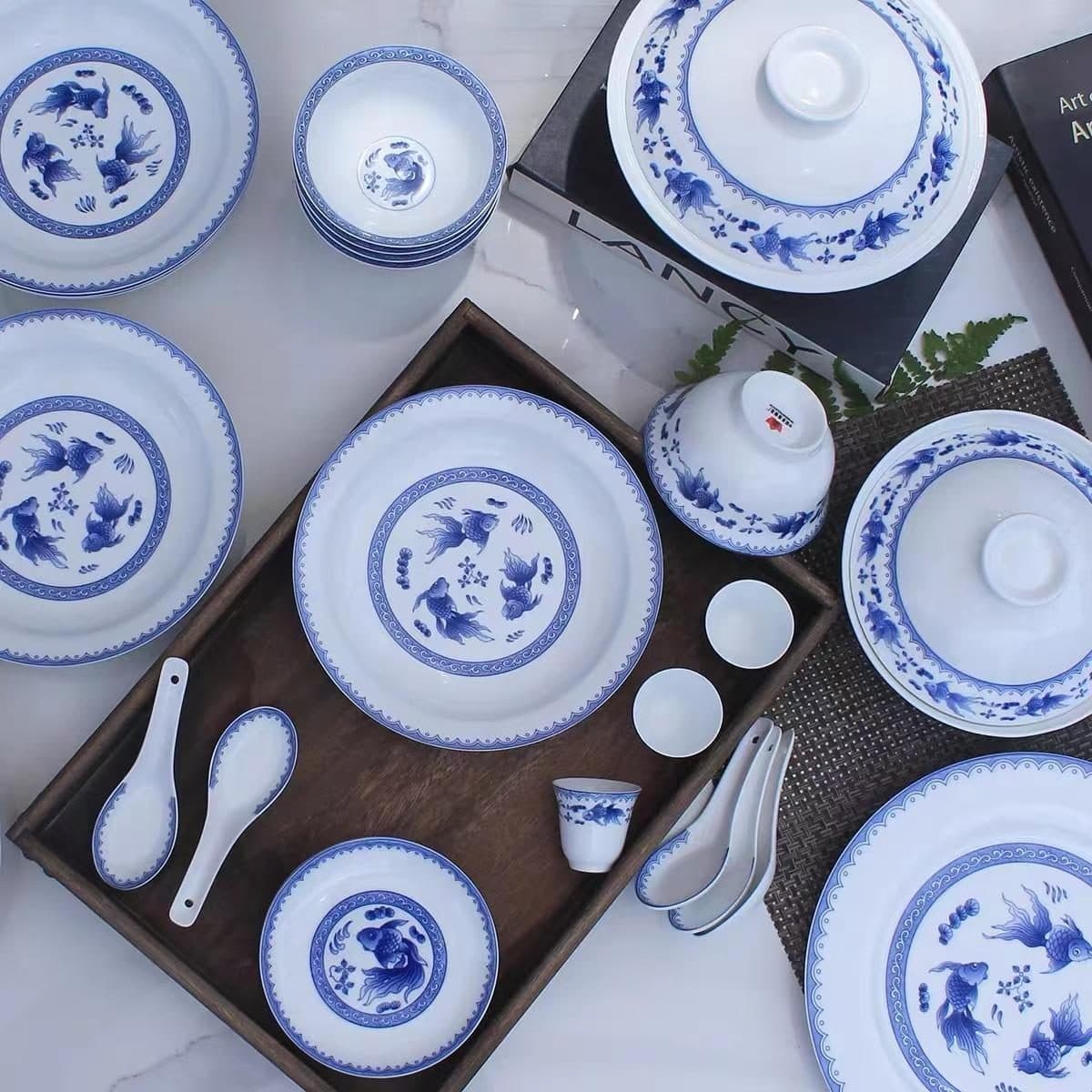 Red Leaf Fish at Play — a 66-piece Chinese porcelain dinner service